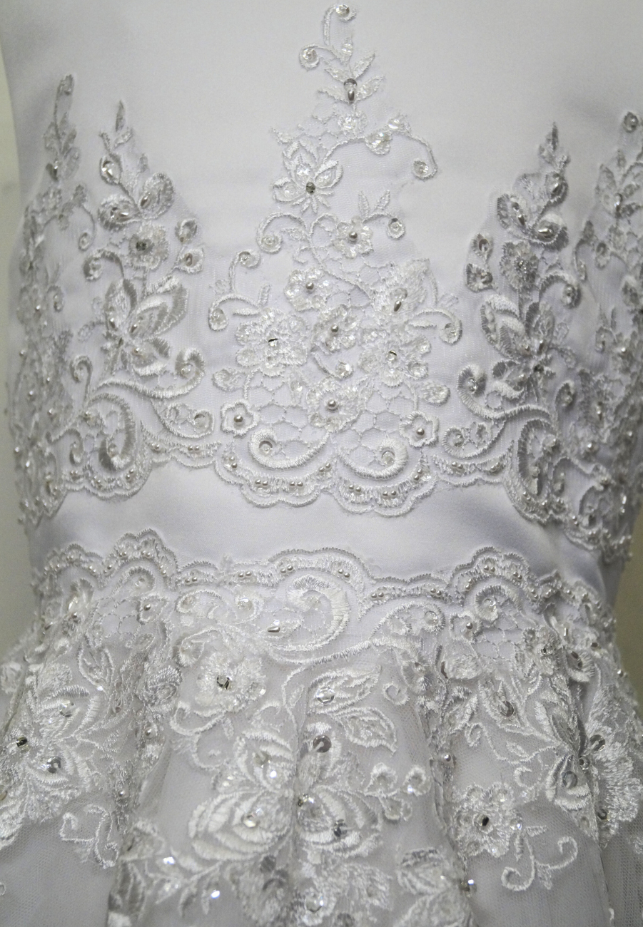 white beaded lace bodice communion dress Expressions Boutique NY, satin and tulle first communion gown, girls beaded white communion dress, elegant lace communion wear Long Island, boutique communion dresses Woodbury NY