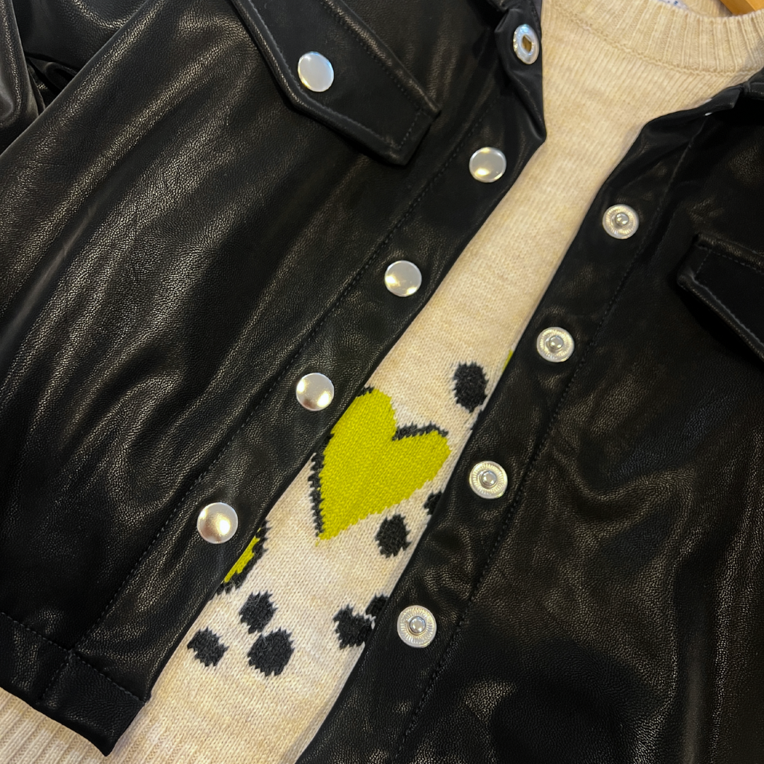 black faux suede jacket, women’s faux suede outerwear, silver button jacket, utility pocket jacket, fall layering jacket, boutique black jacket, soft suede look jacket, cropped suede effect jacket, versatile women’s jacket, modern casual jacket