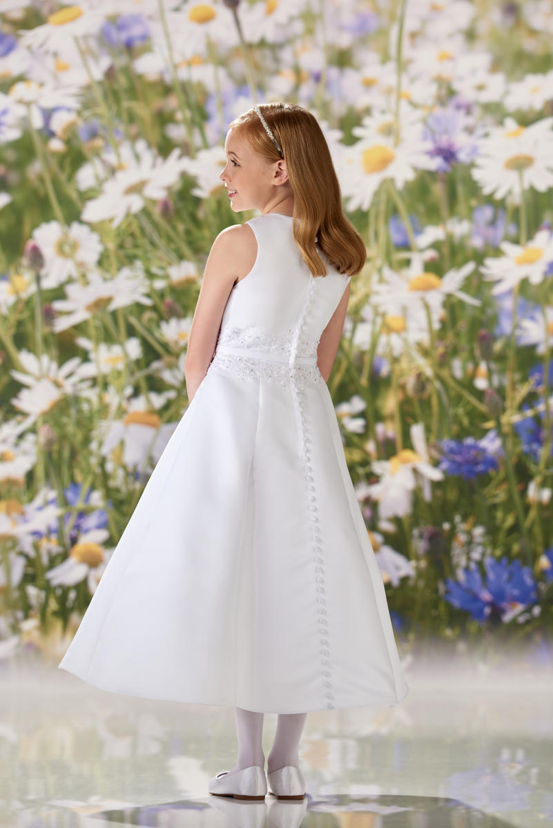 matted satin communion dress Expressions Boutique NY, girls white communion gown, sleeveless satin A-line dress, first communion attire Long Island, boutique communion wear Woodbury NY, elegant satin communion dress