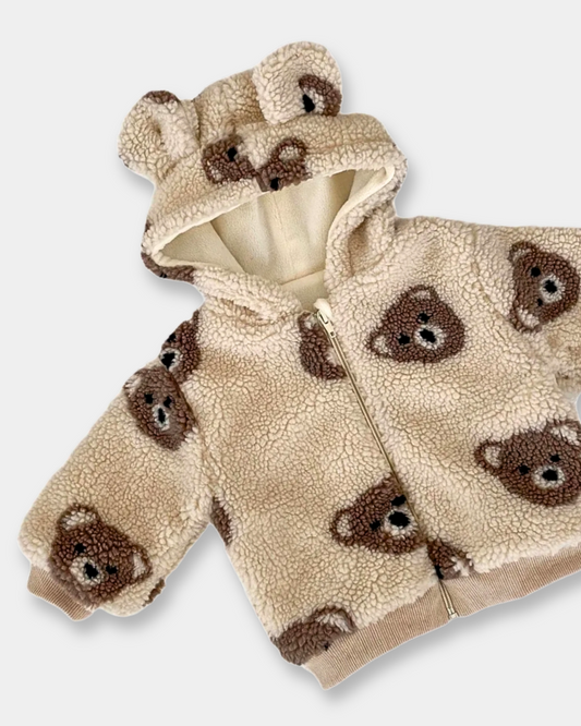 bear plush coat baby, toddler teddy bear jacket, sherpa fleece kids coat, baby bear ear hoodie, plush winter coat for toddlers, boutique bear zip-up jacket, cozy baby outerwear, teddy print kids coat, infant fleece bear hoodie, warm toddler plush jacket