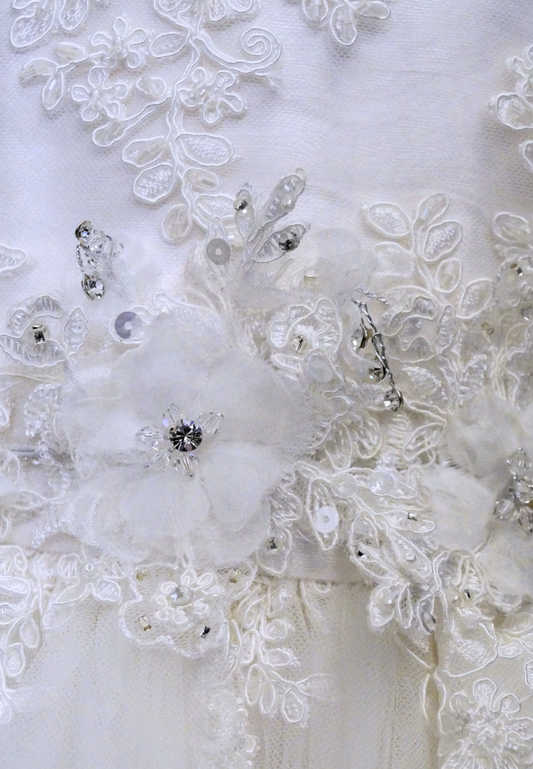 beaded lace communion dress Expressions Boutique NY, one of a kind communion gown, mesh overlay first communion dress, girls white lace communion attire Woodbury NY, boutique communion wear Long Island, elegant lace beaded gown