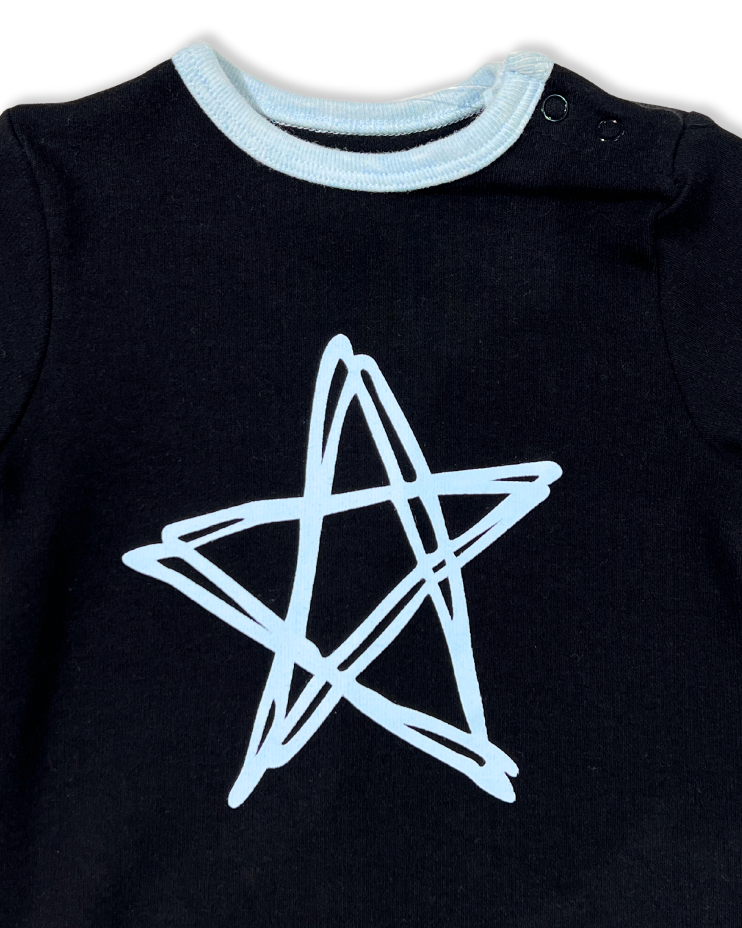 Black w Blue Star Footie, Expressions Boutique, Women and childrens boutique, Woodbury, black baby footie, baby boy star sleeper, boutique baby romper, infant footed one piece, soft cotton baby pajamas, newborn boy sleepsuit, snap closure baby outfit, modern baby boy footie, baby shower boy gift, star print baby romper