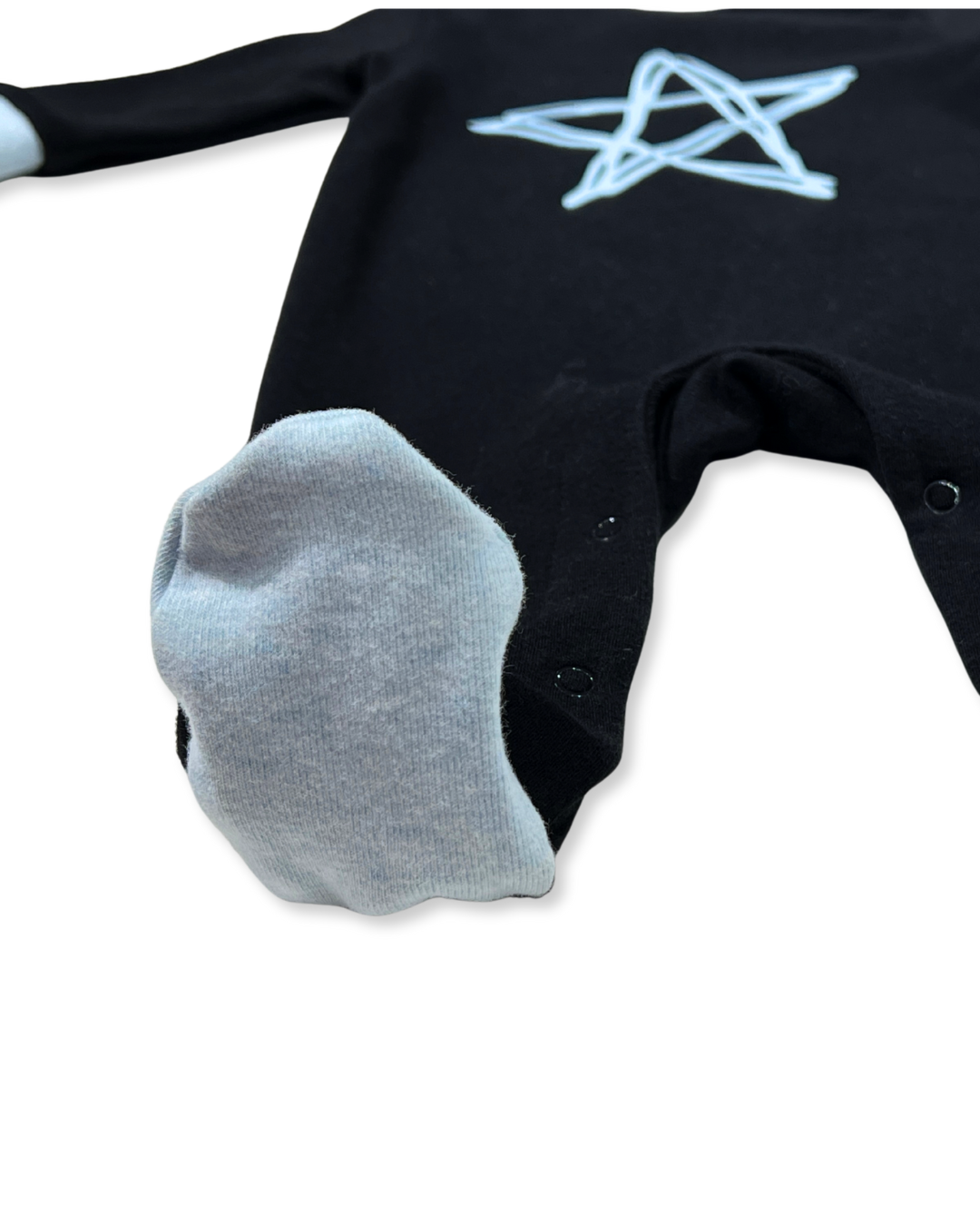 Black w Blue Star Footie, Expressions Boutique, Women and childrens boutique, Woodbury, black baby footie, baby boy star sleeper, boutique baby romper, infant footed one piece, soft cotton baby pajamas, newborn boy sleepsuit, snap closure baby outfit, modern baby boy footie, baby shower boy gift, star print baby romper