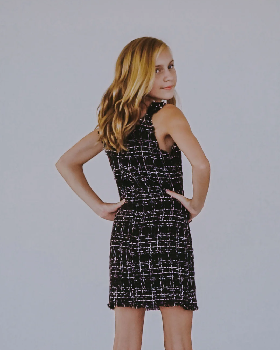 Black Tweed Sleeveless Dress, Expressions Boutique, Women and childrens boutique, Woodbury, girls tweed dress, boutique girls special occasion dress, girls black tweed outfit, girls sleeveless tweed dress, girls holiday dress, chic girls tweed dress, boutique girls formal dress, tweed dress with buttons