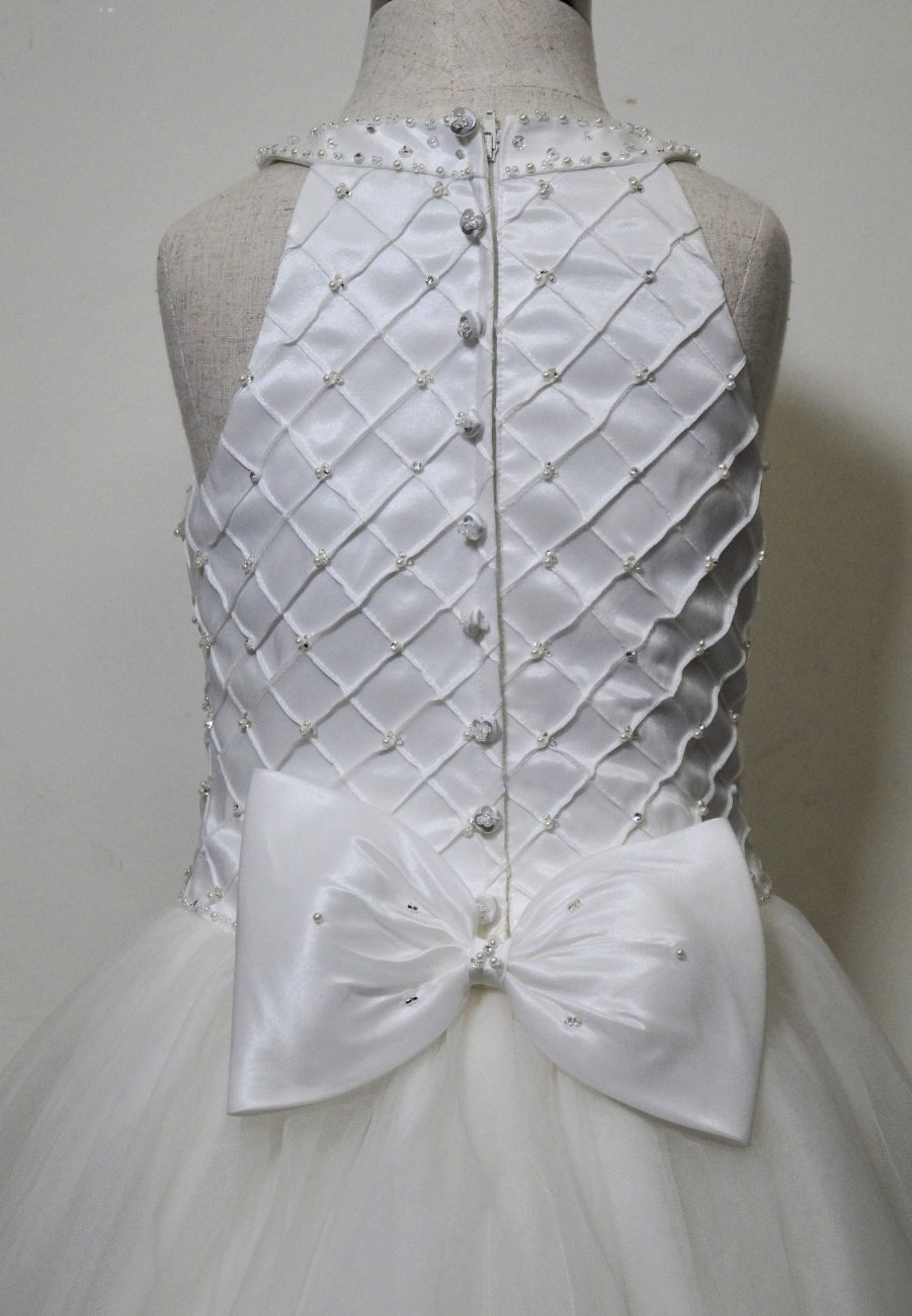 one of a kind beaded communion dress Expressions Boutique NY, white tulle communion gown, girls beaded bodice communion dress, boutique communion wear Long Island, elegant white first communion dress, special occasion gown Woodbury NY