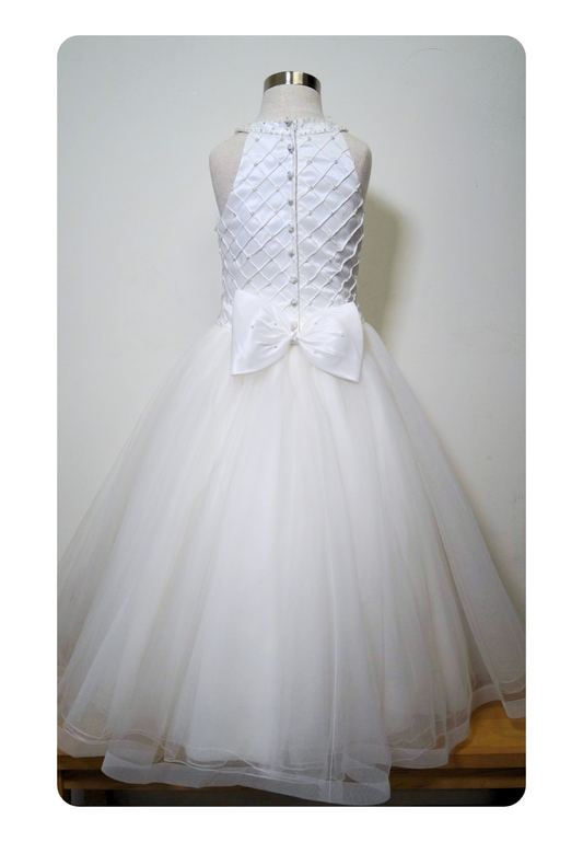 one of a kind beaded communion dress Expressions Boutique NY, white tulle communion gown, girls beaded bodice communion dress, boutique communion wear Long Island, elegant white first communion dress, special occasion gown Woodbury NY