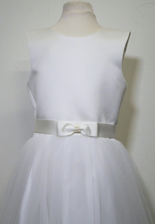 satin and tulle communion dress Expressions Boutique NY, pearl bow communion gown, diamond white communion dress, girls white satin bodice tulle skirt, boutique communion wear Long Island, elegant first communion dress Woodbury NY
