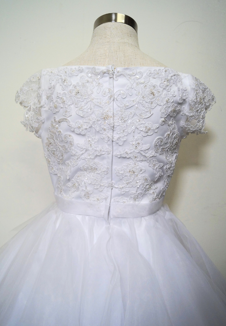 beaded lace bodice communion dress Expressions Boutique NY, white tulle communion gown, tiered communion dress for girls, boutique first communion dress Long Island, elegant lace white communion dress, special occasion gown Woodbury NY