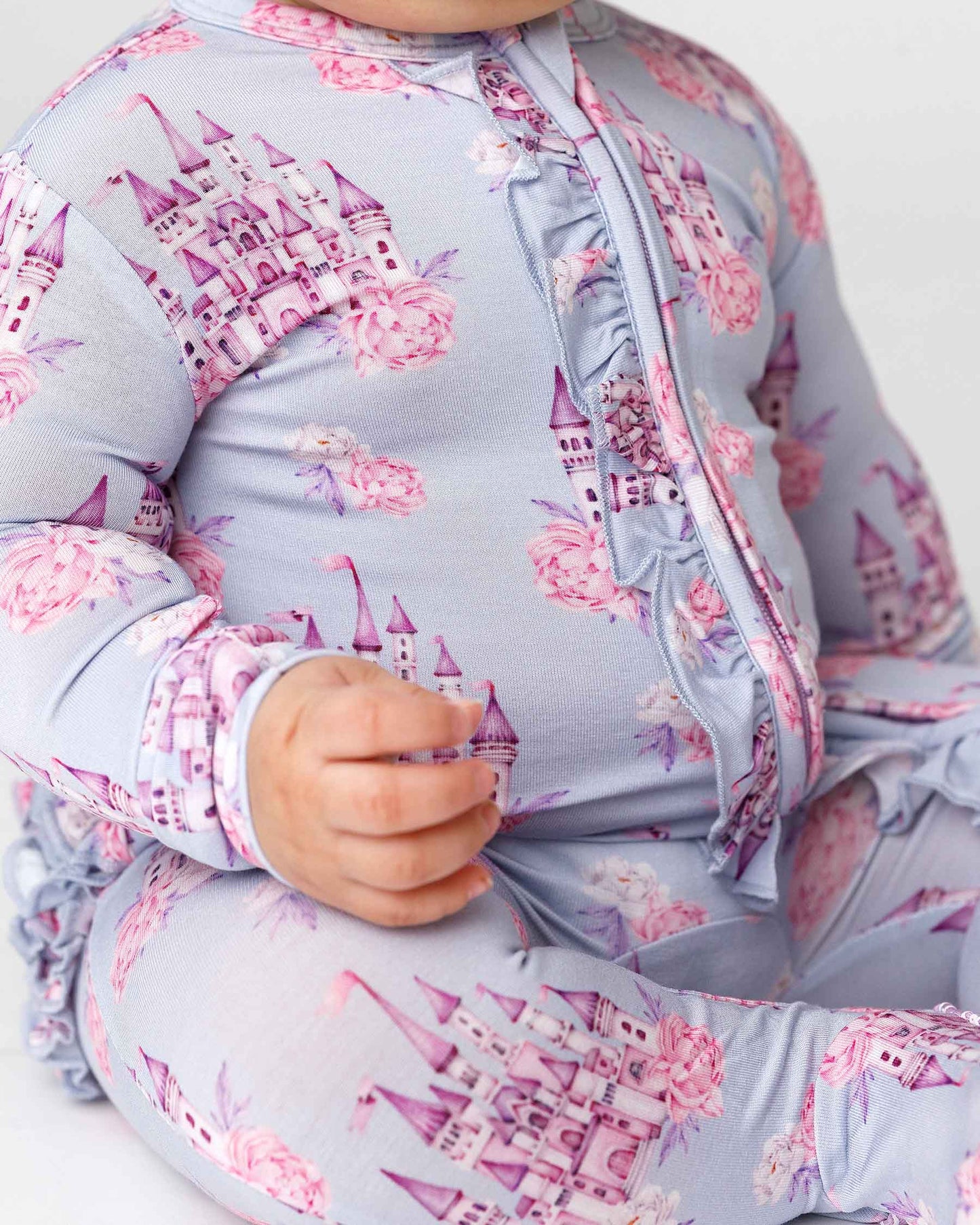 boutique baby bamboo footie Expressions Boutique NY, castle print ruffled zip baby sleeper, lavender floral baby onesie, soft bamboo footed pajamas, baby girl zippered sleeper breathable fabric