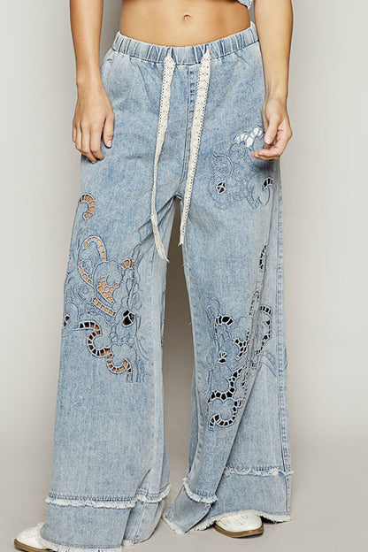 wide leg denim pants, vintage wash jeans, cutout embroidered denim, boho festival pants, women’s wide leg twill bottoms, boutique denim trousers, boho jeans outfit, relaxed fit denim pants