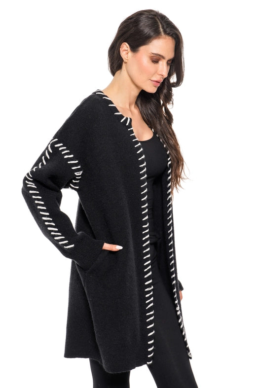 black duster cardigan, black longline sweater with stitching, boutique knit duster, black and white cardigan women, layering cardigan boutique, Expressions Boutique NY, Woodbury women’s boutique, black contrast stitch cardigan, stylish knit duster with pockets, chic open front cardigan