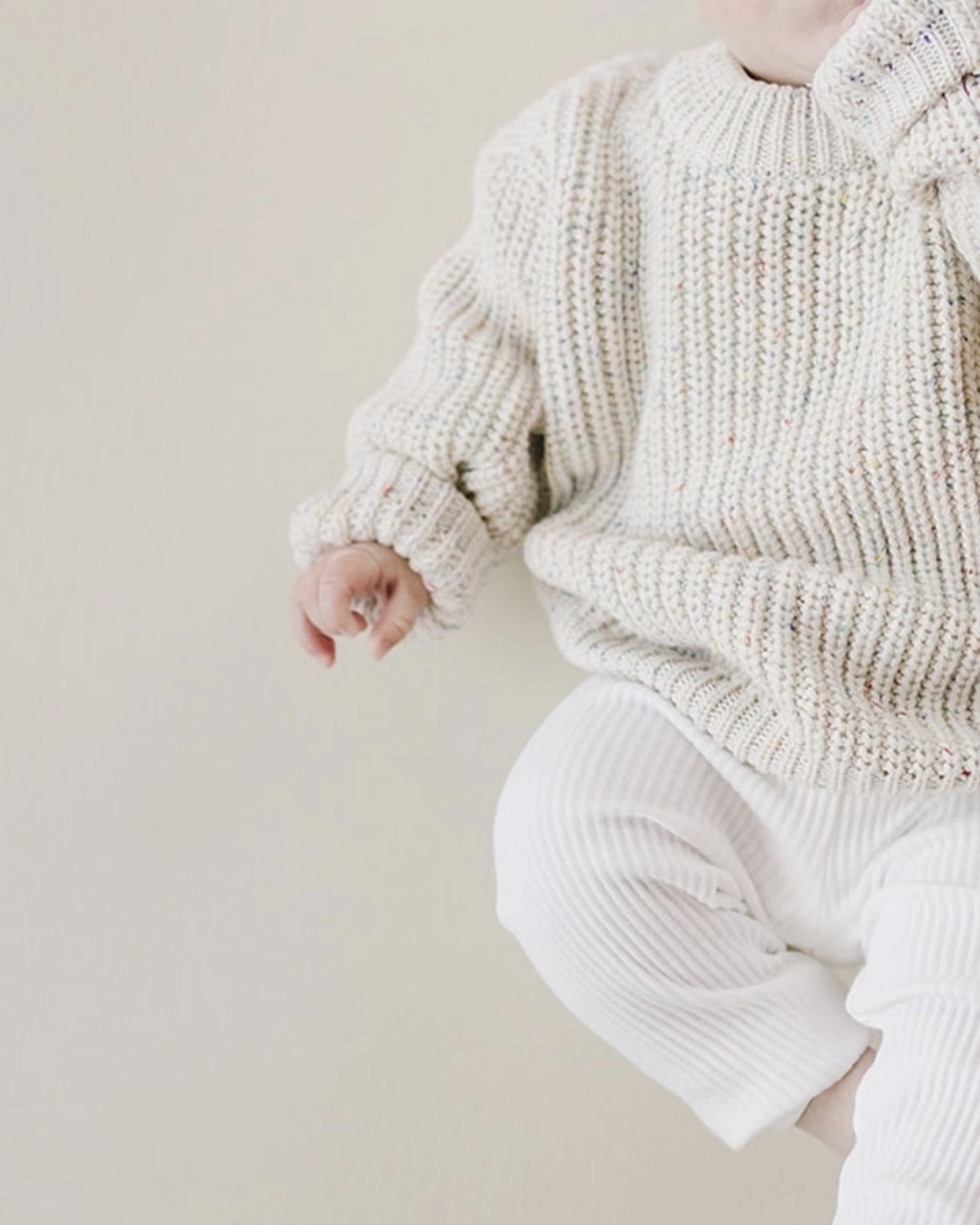 confetti knit baby sweater, chunky knit infant sweater, boutique baby clothing, cozy neutral baby sweater, speckled knit toddler sweater, fall baby sweater, unisex baby sweater, boutique infant knitwear, knit baby pullover, neutral baby outfit, baby shower gift, boutique children’s clothing