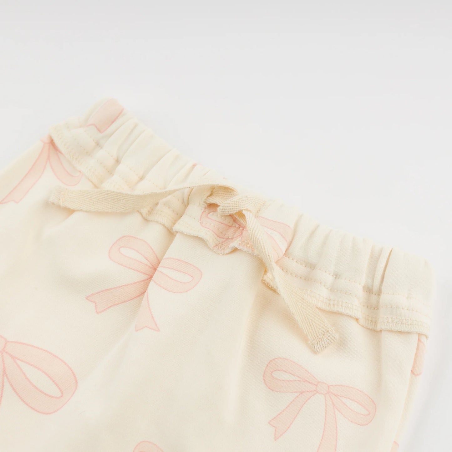 big bow baby outfit, pink bow toddler set, boutique baby girl clothing, Brooklyn Box pant set, baby girl 2-piece outfit, bow print loungewear, cute baby girl bow outfit, soft cotton toddler set, boutique bow baby clothes, stylish baby girl outfit