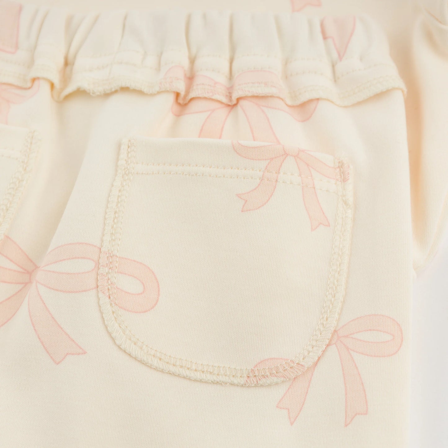 big bow baby outfit, pink bow toddler set, boutique baby girl clothing, Brooklyn Box pant set, baby girl 2-piece outfit, bow print loungewear, cute baby girl bow outfit, soft cotton toddler set, boutique bow baby clothes, stylish baby girl outfit