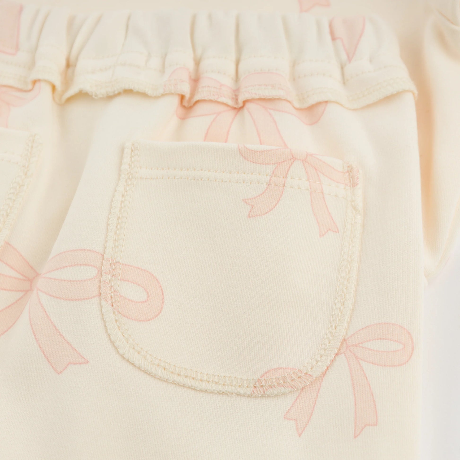big bow baby outfit, pink bow toddler set, boutique baby girl clothing, Brooklyn Box pant set, baby girl 2-piece outfit, bow print loungewear, cute baby girl bow outfit, soft cotton toddler set, boutique bow baby clothes, stylish baby girl outfit
