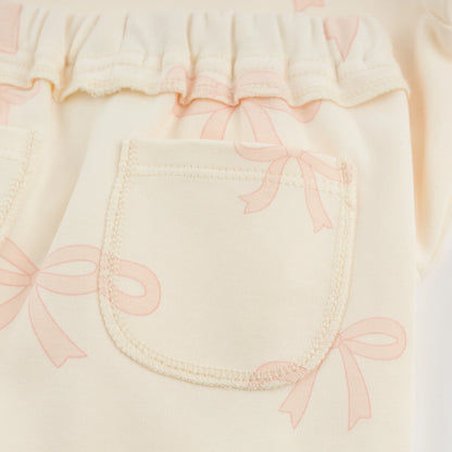 big bow baby outfit, pink bow toddler set, boutique baby girl clothing, Brooklyn Box pant set, baby girl 2-piece outfit, bow print loungewear, cute baby girl bow outfit, soft cotton toddler set, boutique bow baby clothes, stylish baby girl outfit