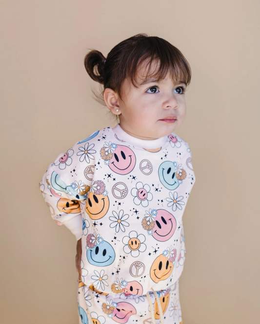 2pc jogger set kids, smiley face jogger outfit, peace sign kids clothing, daisy print kids set, retro kids jogger outfit, pastel toddler loungewear, boutique kids jogger set, groovy girl jogger set, girls matching jogger outfit, trendy toddler lounge set, back to school clothes, school outfits, pre-k clothing