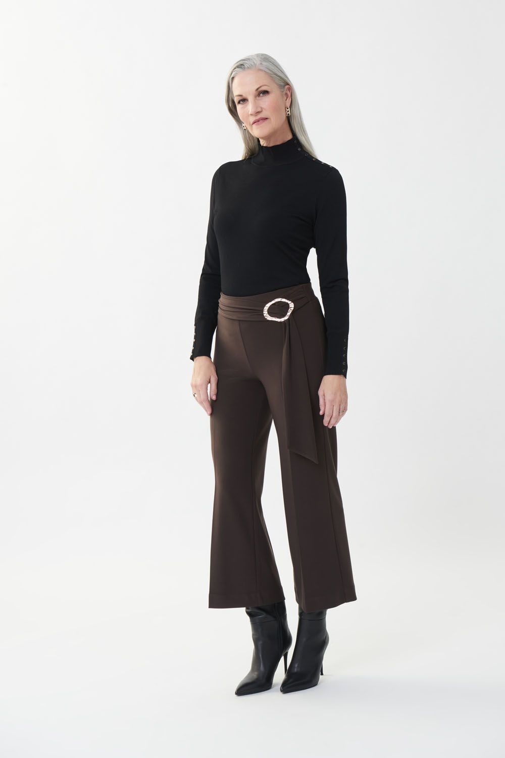 Black faux turtleneck featuring gold faux buttons