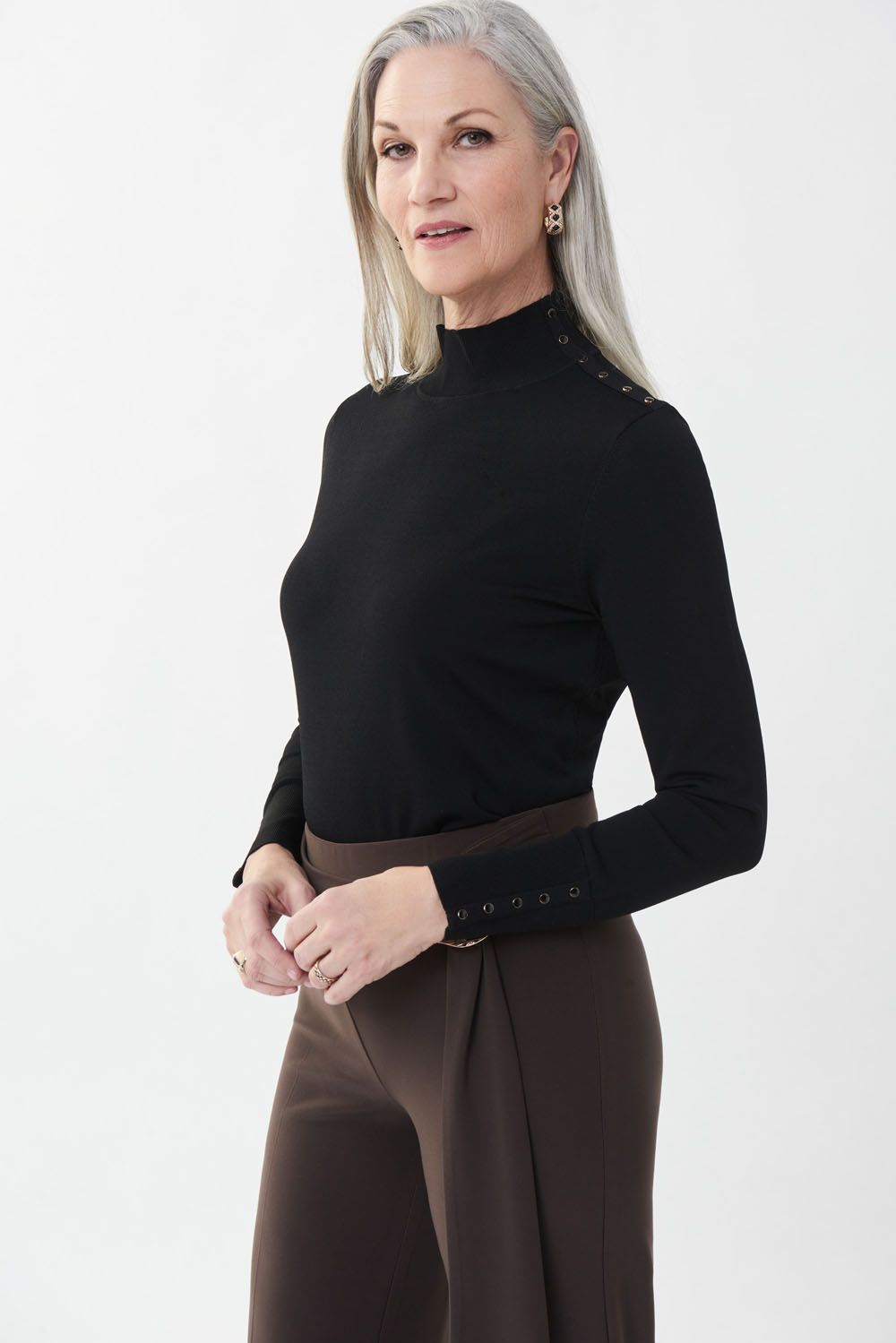 Black faux turtleneck featuring gold faux buttons