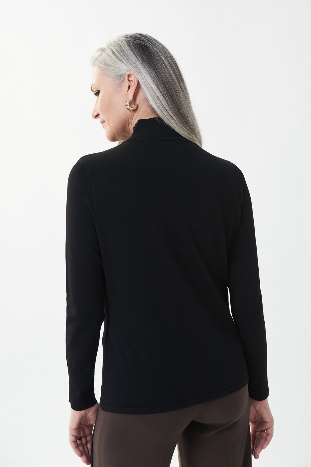 Black faux turtleneck featuring gold faux buttons