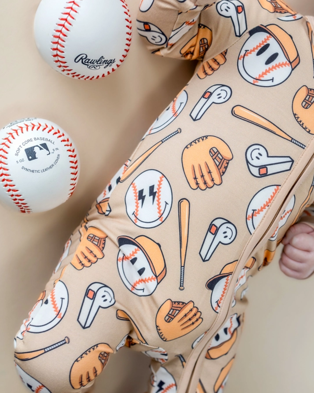 baseball baby romper, bamboo infant romper, sports themed baby clothes, neutral baby romper, cozy infant outfit, boutique baby romper, long sleeve baby romper, playful baby boy outfit, unisex baby romper, easy zip baby romper, sporty infant clothing, toddler game day outfit