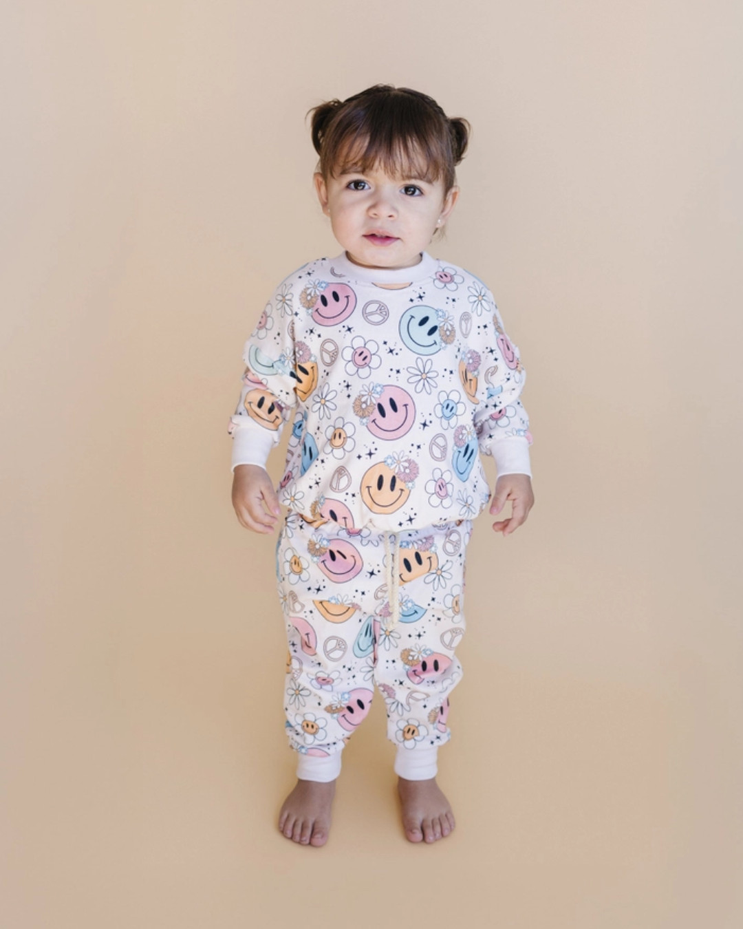 2pc jogger set kids, smiley face jogger outfit, peace sign kids clothing, daisy print kids set, retro kids jogger outfit, pastel toddler loungewear, boutique kids jogger set, groovy girl jogger set, girls matching jogger outfit, trendy toddler lounge set, back to school clothes, school outfits, pre-k clothing