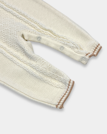 baby boy off white knit romper, cream romper with tan trim, boutique knit baby clothing, baby boy christening romper, newborn heirloom romper, neutral baby knit outfit, baby boy holiday outfit knit, boutique romper boy neutral, classic knit baby clothing, Expressions Boutique NY, Woodbury baby boutique, elegant baby boy romper