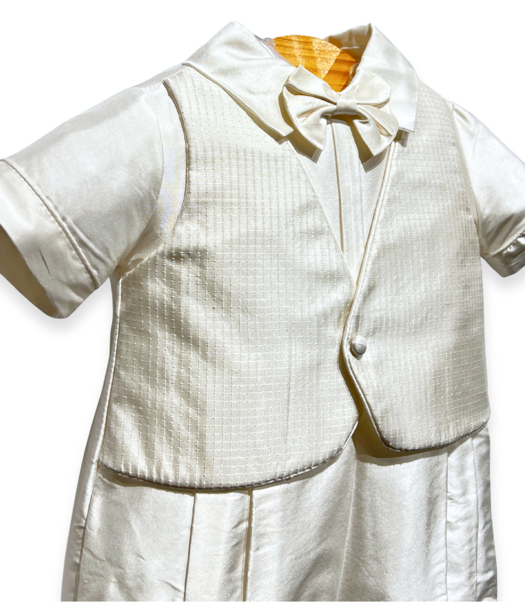 silk christening romper Expressions Boutique NY, short sleeve knicker set, baby boy silk baptism outfit, ivory romper with bowtie, boutique christening wear Long Island, champagne trim baptism romper