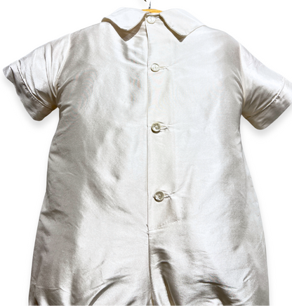 silk christening romper Expressions Boutique NY, short sleeve knicker set, baby boy silk baptism outfit, ivory romper with bowtie, boutique christening wear Long Island, champagne trim baptism romper