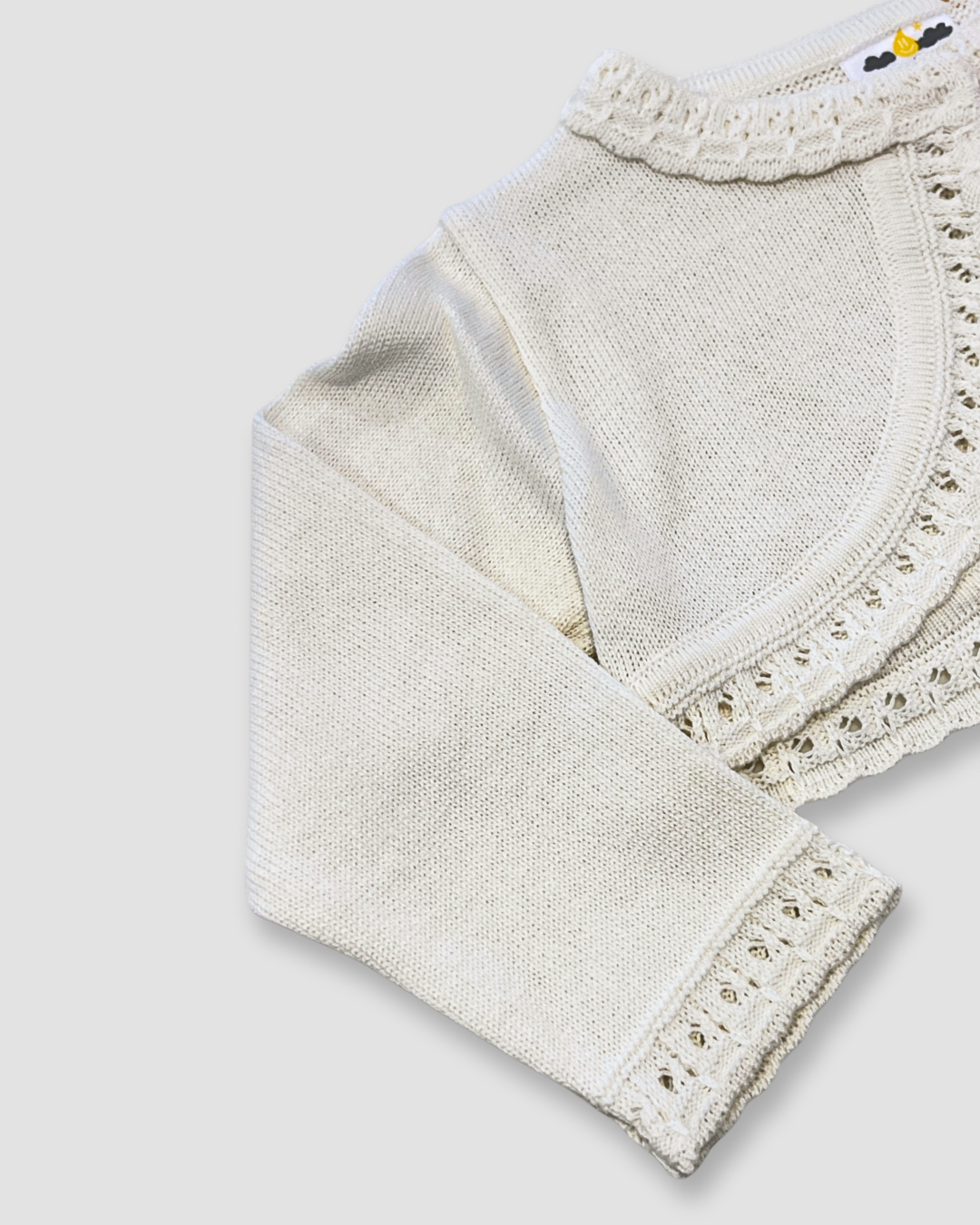 girls knit bolero sweater Expressions Boutique NY, ivory communion cardigan, white crochet trim shrug, elegant baby bolero sweater, boutique special occasion cover-up