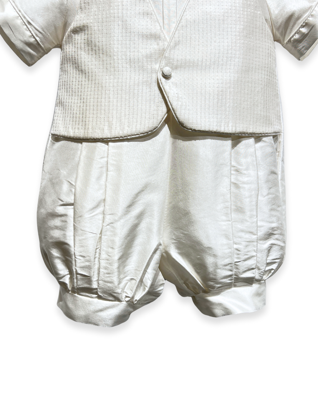 silk christening romper Expressions Boutique NY, short sleeve knicker set, baby boy silk baptism outfit, ivory romper with bowtie, boutique christening wear Long Island, champagne trim baptism romper