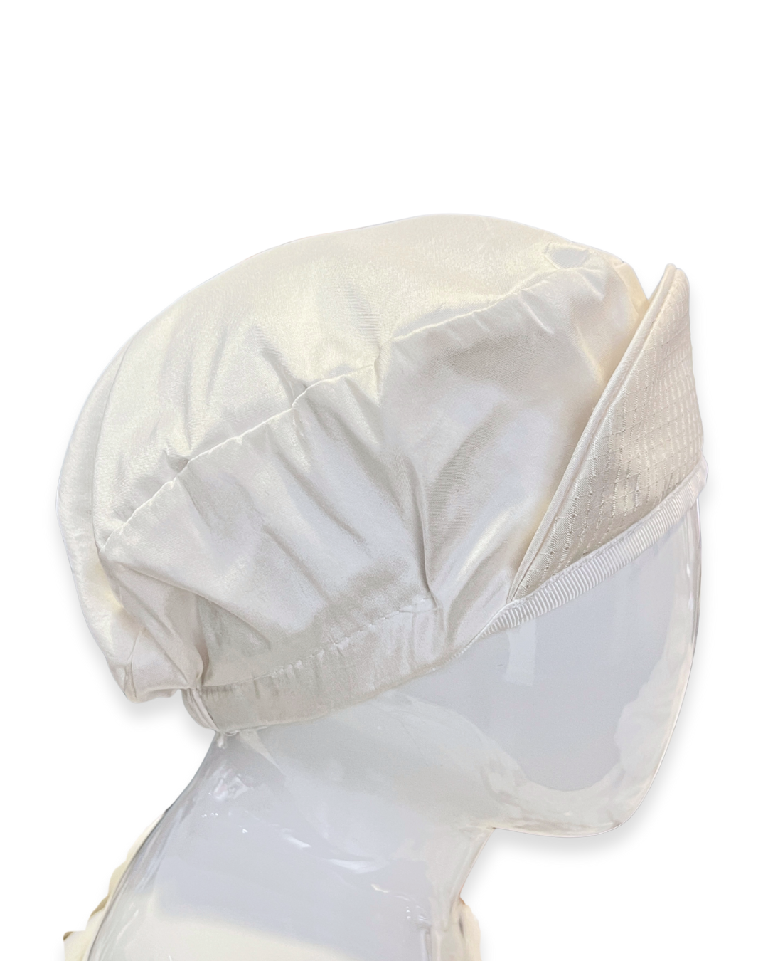 silk christening romper Expressions Boutique NY, short sleeve knicker set, baby boy silk baptism outfit, ivory romper with bowtie, boutique christening wear Long Island, champagne trim baptism romper