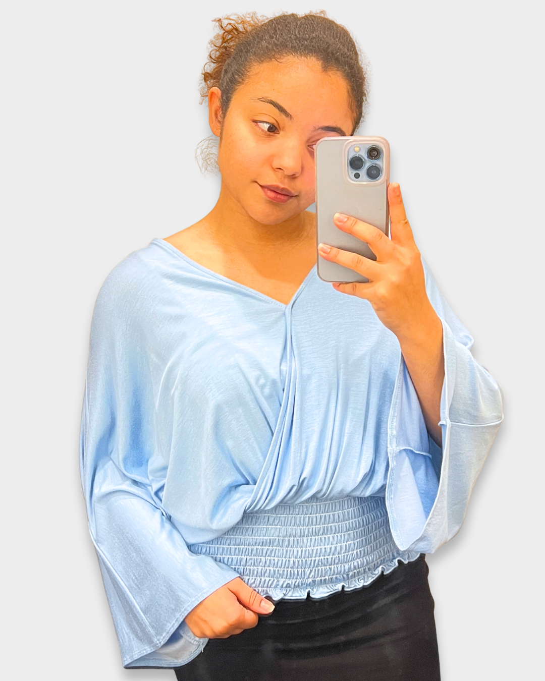 women’s smocked top, light blue blouse, v-neck draped top, boutique women’s fashion, silky smocked shirt, trendy women’s tops, dressy casual blouse, lightweight long sleeve top
