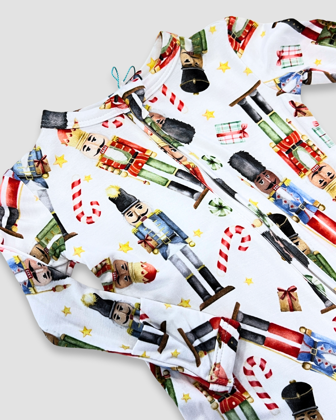Nutcracker baby footie Expressions Boutique NY, holiday baby pajamas, Christmas soldier onesie, festive baby sleepwear, boutique holiday outfit, double zip baby footie