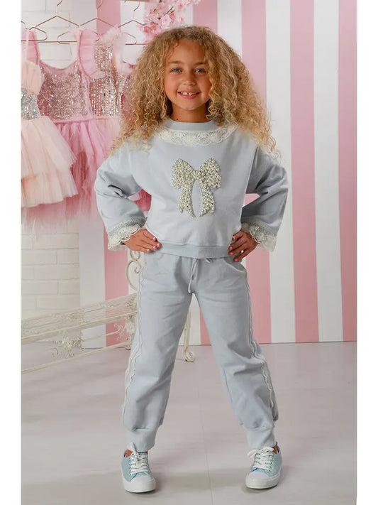 ice pop blue sweatpant set, boutique girls loungewear, 2-piece girls outfit, sequin bow top set, lace trim sweatshirt set, boutique kids clothing, stylish toddler outfit, comfy girls sweat set, girls matching sweatpant set, elevated casual kidswear, trendy girls fall outfit, toddler boutique loungewear