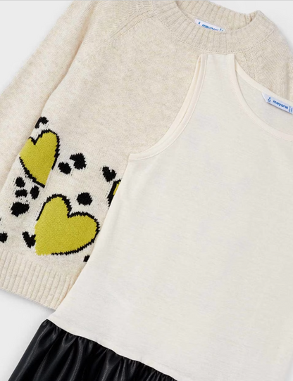girls layered dress set, heart print knit dress, kids boutique sweater dress, beige and black girls outfit, chartreuse heart dress, layered look girls dress, cozy fall girls dress, knit sweater dress for kids, cute abstract print girls outfit, trendy girls winter dress