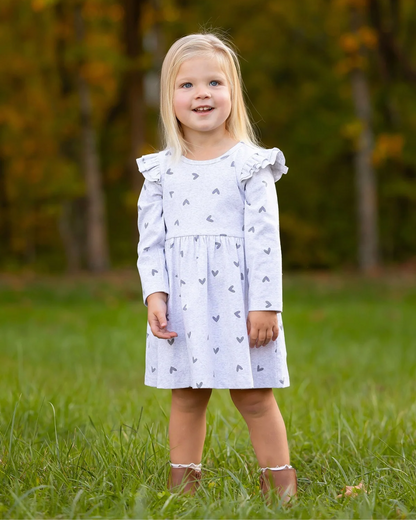 heart print toddler dress, girls grey dress with hearts, boutique toddler clothing, long sleeve ruffle dress, playful toddler girl outfit, kids boutique fashion, cozy toddler dress, everyday toddler outfits, boutique fall dresses for kids, stylish girls clothing, pre-k outfits, school picture day dress