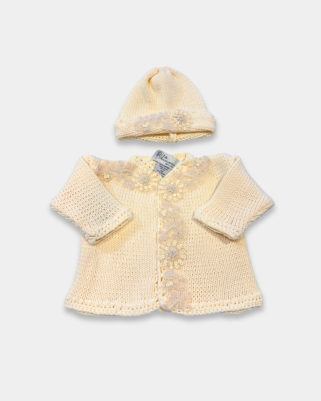 boutique baby girl sweater hat set, ivory sequin baby girl knitwear, pink cotton baby sweater set, baby girl knit cardigan Expressions Boutique NY, christening baby girl outfit boutique, heirloom knit sweater set for baby, luxury newborn knitwear girls, sequin flower baby girl outfit, boutique baby shower gift girl, matching baby blanket and sweater set