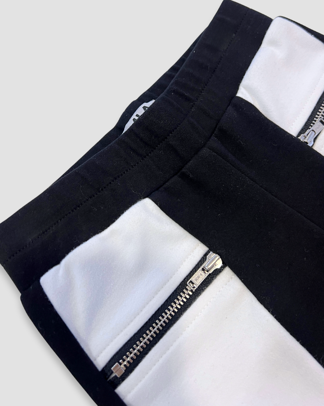 girls black and white pants, color block pants kids boutique, Expressions Boutique NY girls fashion, trendy zipper pants for girls, monochrome children’s outfit