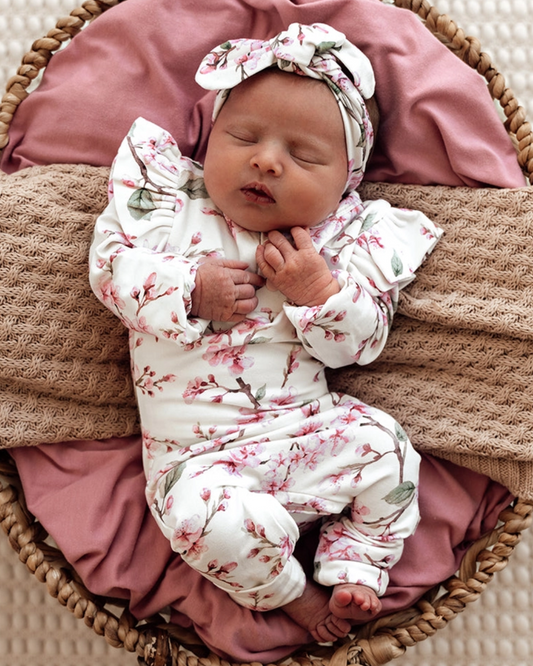 cherry blossom baby romper, floral organic growsuit, baby girl flower outfit, boutique infant romper, eco friendly baby clothes, newborn cherry blossom footie, baby shower gift girl, soft cotton floral sleeper, baby girl ruffle romper, spring print baby outfit