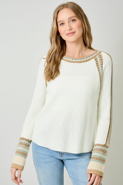 raglan sleeve sweater, ivory waffle knit sweater, crochet trim knit top, boutique ivory sweater, striped cuff sweater, textured knit pullover, cozy chic fall sweater, ivory long sleeve knit, crochet detail women’s sweater, everyday casual knitwear