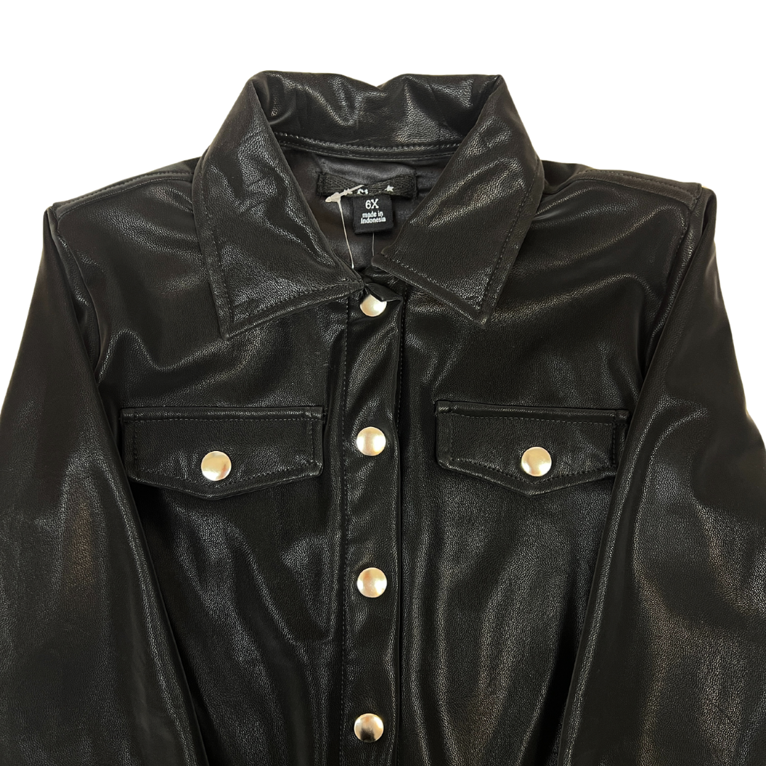 black faux suede jacket, women’s faux suede outerwear, silver button jacket, utility pocket jacket, fall layering jacket, boutique black jacket, soft suede look jacket, cropped suede effect jacket, versatile women’s jacket, modern casual jacket