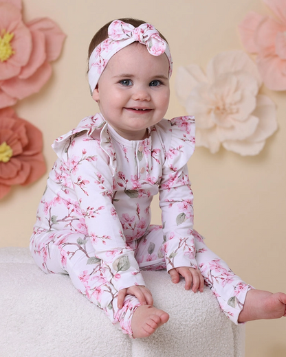 cherry blossom baby romper, floral organic growsuit, baby girl flower outfit, boutique infant romper, eco friendly baby clothes, newborn cherry blossom footie, baby shower gift girl, soft cotton floral sleeper, baby girl ruffle romper, spring print baby outfit