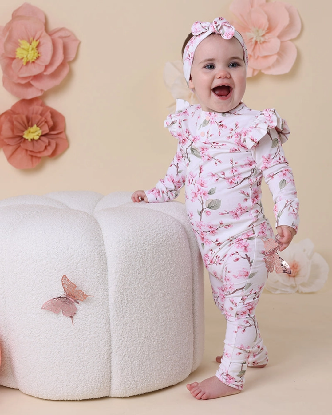 expressions boutique cherry blossom baby romper, floral organic growsuit, baby girl flower outfit, boutique infant romper, eco friendly baby clothes, newborn cherry blossom footie, baby shower gift girl, soft cotton floral sleeper, baby girl ruffle romper, spring print baby outfit