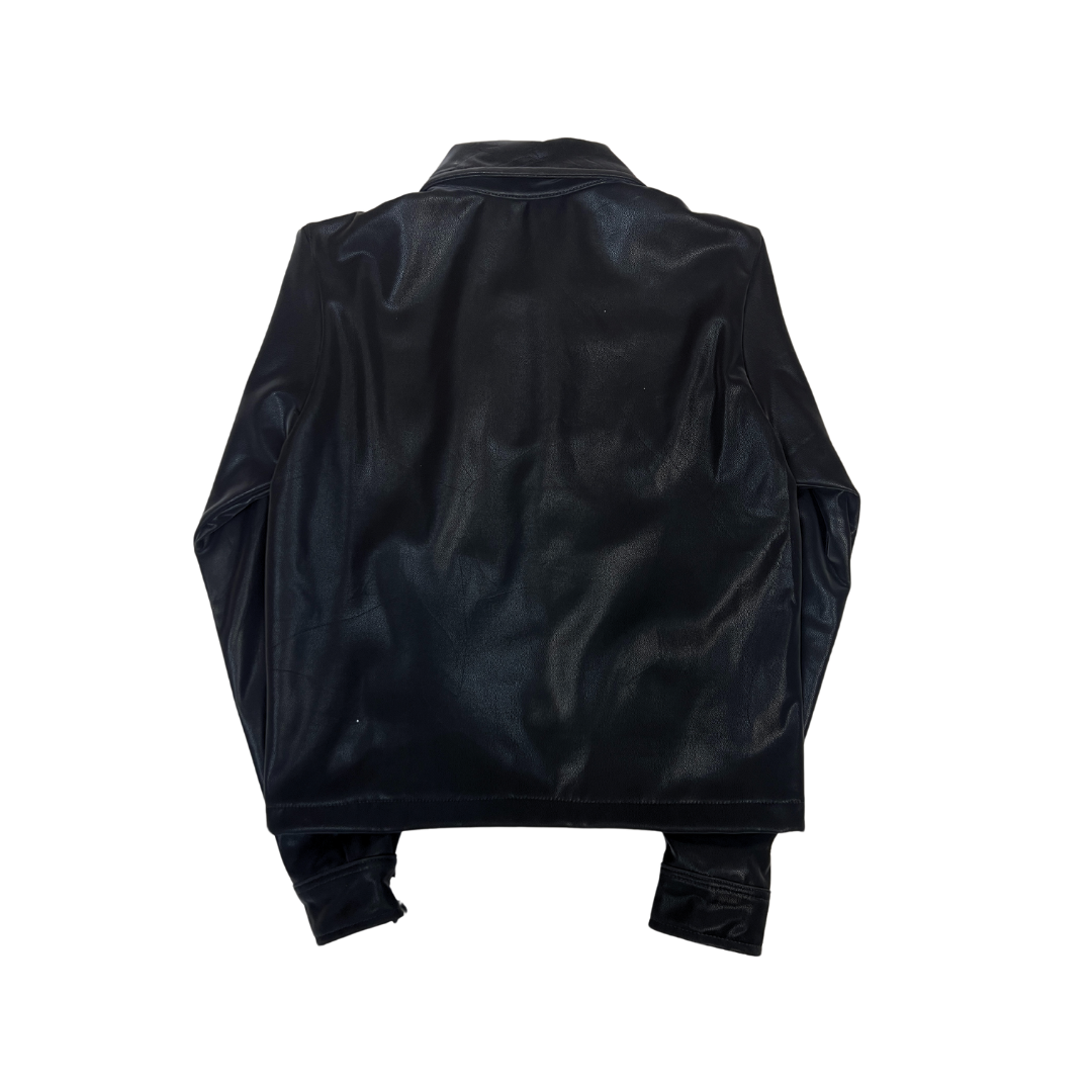 black faux suede jacket, women’s faux suede outerwear, silver button jacket, utility pocket jacket, fall layering jacket, boutique black jacket, soft suede look jacket, cropped suede effect jacket, versatile women’s jacket, modern casual jacket