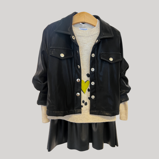 black faux suede jacket, women’s faux suede outerwear, silver button jacket, utility pocket jacket, fall layering jacket, boutique black jacket, soft suede look jacket, cropped suede effect jacket, versatile women’s jacket, modern casual jacket