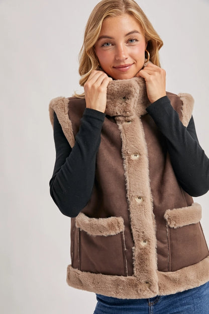 faux suede shearling vest, women’s winter layering vest, boutique cozy faux fur vest, shearling trim suede vest women, chic brown faux suede vest, rustic fall layering vest, boutique winter outfit topper, faux shearling lined vest, casual chic fall vest, boutique women’s outerwear vest