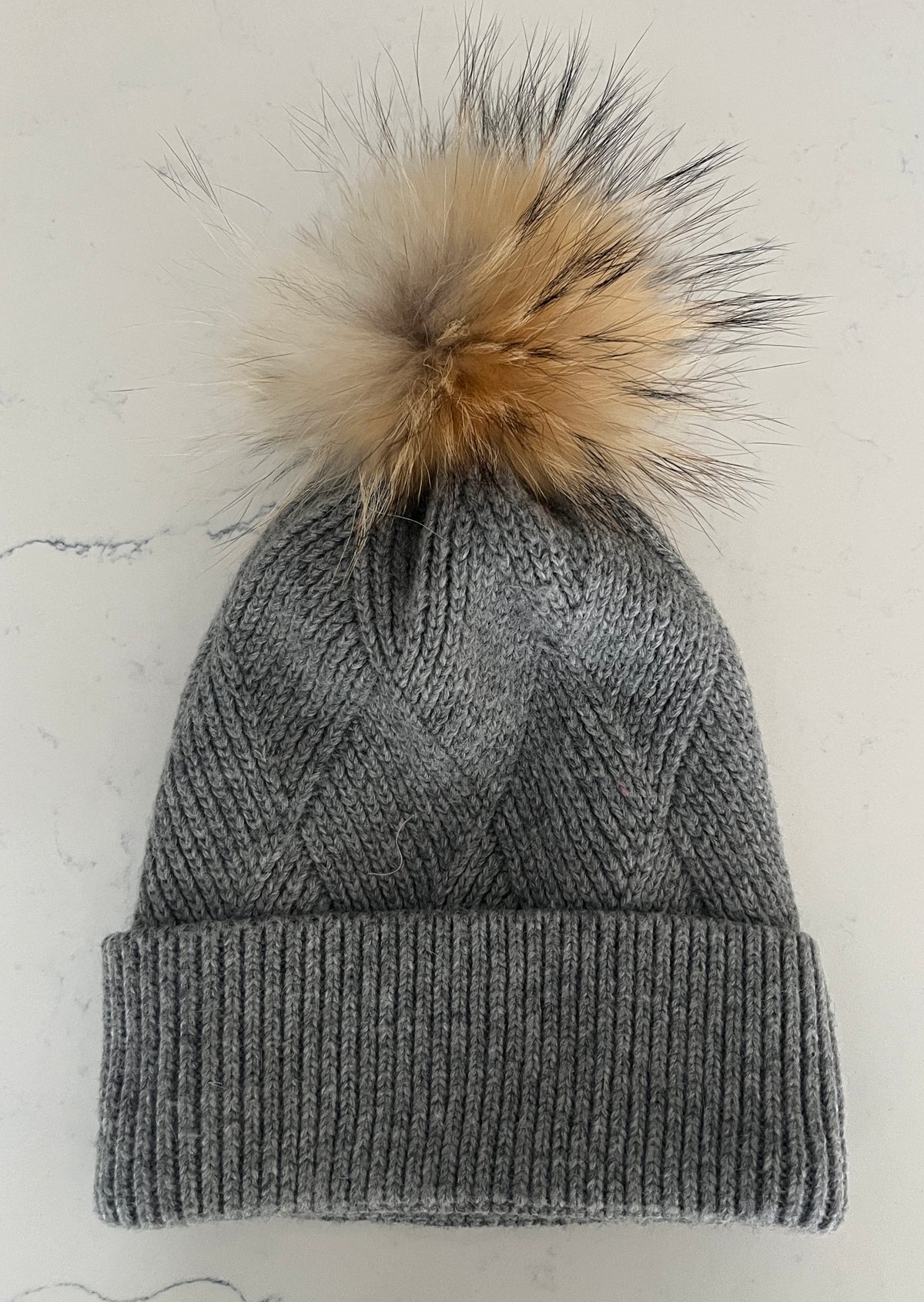 Melina’s Light Grey Cable Knit Cashmere Hat with Genuine Detachable Raccoon Pom Pom-Women’s Winter Hat