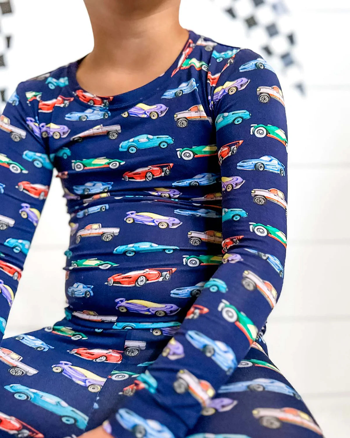 toddler boys car pajamas, kids trucks lounge set, boutique boys pajama set, navy car print pjs, 2 piece kids car sleepwear, Expressions Boutique NY, Woodbury boutique kids clothes, children’s pajamas with cars, boys holiday sleep set, toddler boys lounge outfit, comfy boys pajama set, car print long sleeve pajamas