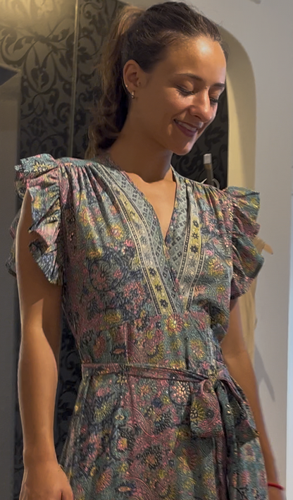 metallic floral wrap dress, ruffle sleeve maxi, wedding guest wrap dress, shimmer wrap gown, boutique metallic print dress, flutter sleeve occasion dress, tie waist maxi dress, romantic evening dress, floral shimmer party dress, garden wedding guest outfit